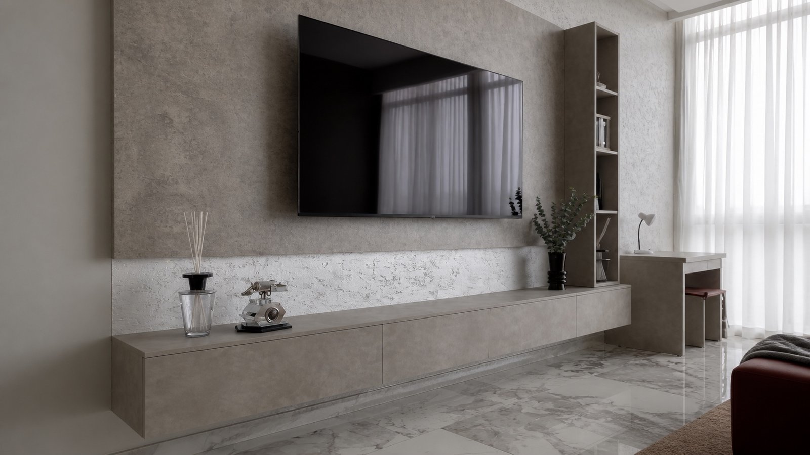 Completed DMI floating media console beneath a wall-mounted television and textured wall panels