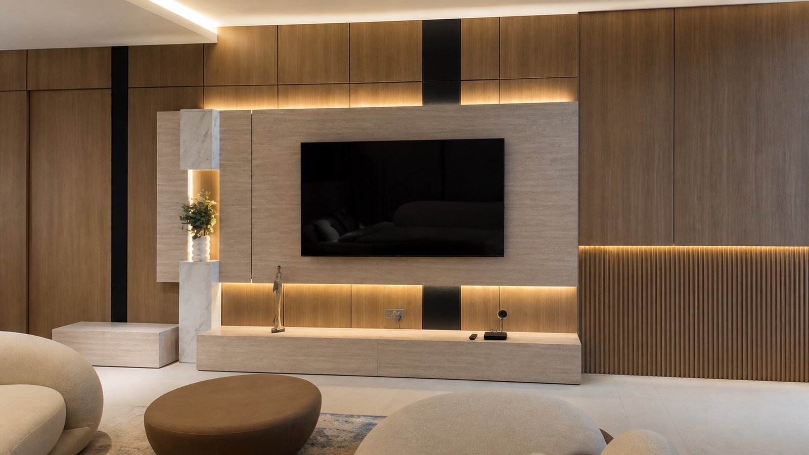 Completed DMI media wall with timber panels, stone-look television panel and integrated warm lighting